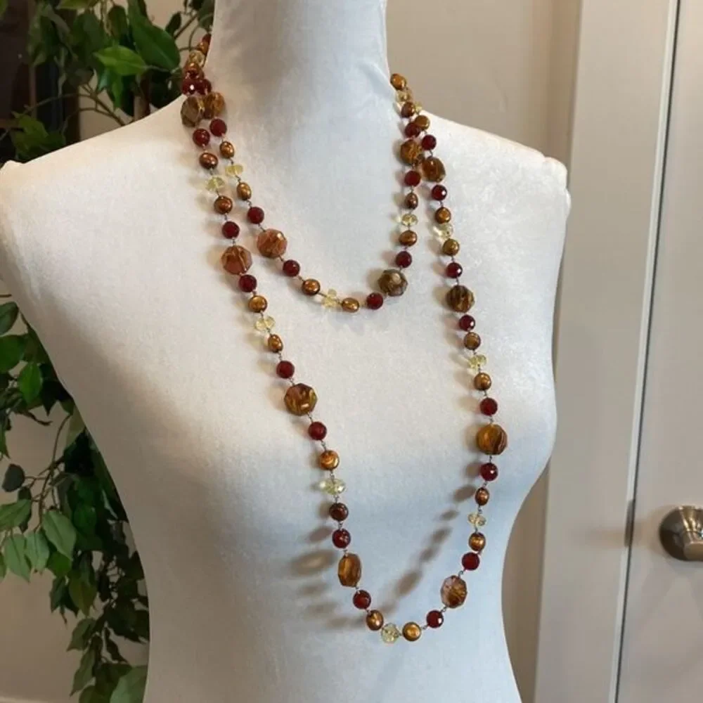 Double strand necklace Unique blend of beads and pearls. Toggle closure